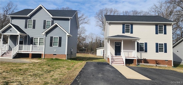 traditional-style home with crawl space, a front lawn, and a porch