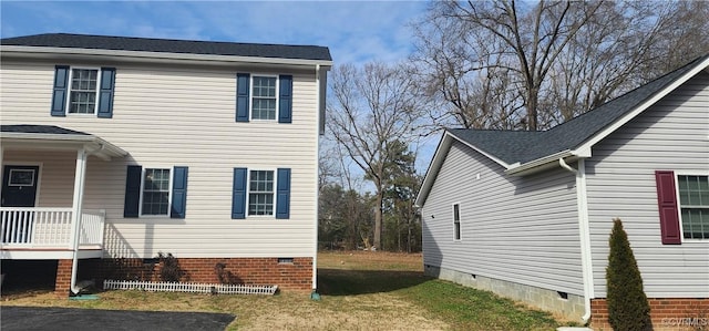 view of property exterior with crawl space