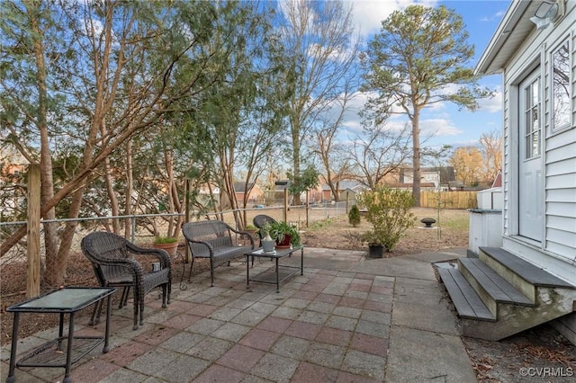 view of patio / terrace with entry steps and a fenced backyard