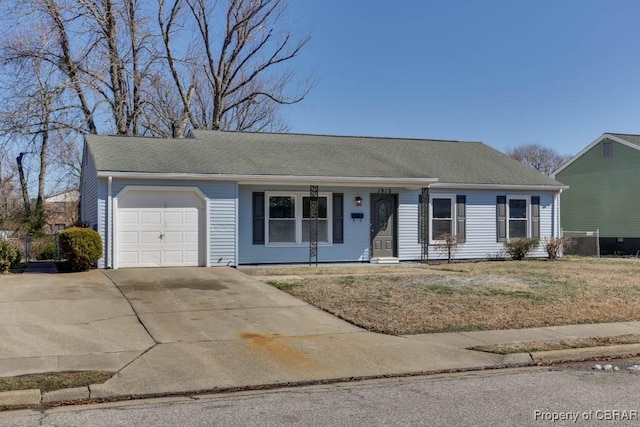 ranch-style house featuring an attached garage, driveway, a front lawn, and a shingled roof