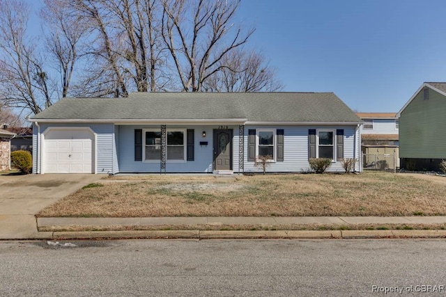 ranch-style house featuring concrete driveway, a front lawn, roof with shingles, and an attached garage