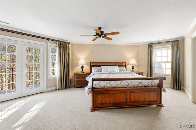 bedroom with access to exterior, visible vents, and ornamental molding