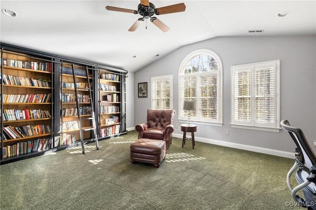 living area featuring visible vents, baseboards, carpet, and vaulted ceiling