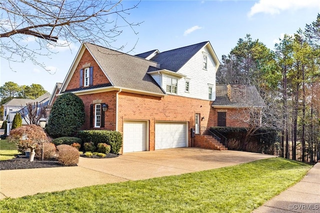 view of side of home with brick siding, an attached garage, a shingled roof, a yard, and driveway