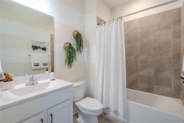 bathroom with shower / tub combo, vanity, and toilet