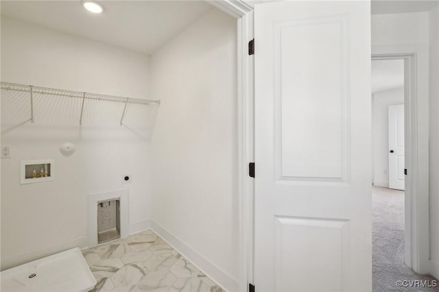 washroom with gas dryer hookup, laundry area, washer hookup, baseboards, and electric dryer hookup