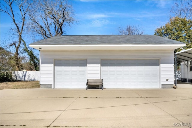 detached garage with fence