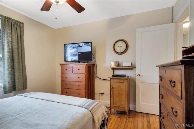 bedroom featuring a ceiling fan and light wood-style floors