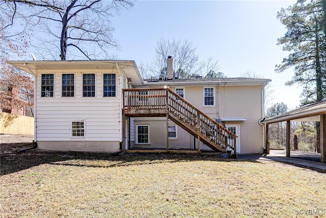 back of house with fence, a chimney, a wooden deck, and stairs