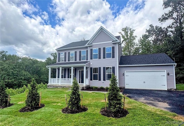 28 Clydesdale Rd, Fredericksburg, VA 22405 - view of front of home featuring covered porch, a garage, asphalt driveway, and a front yard