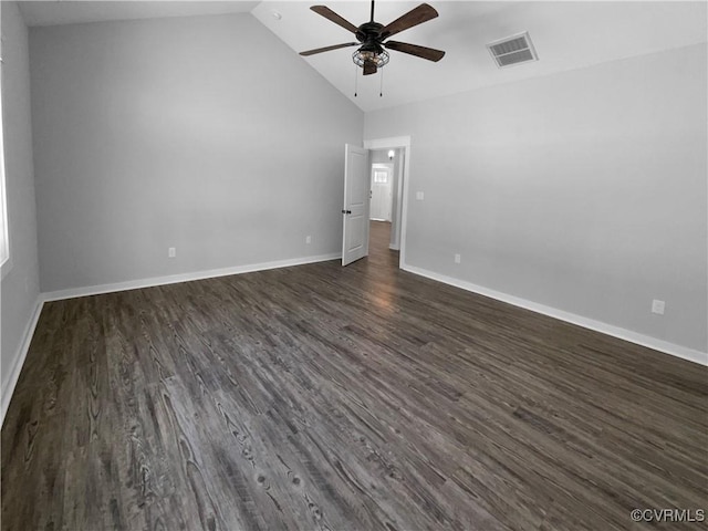 spare room with dark wood-style floors, ceiling fan, visible vents, and baseboards