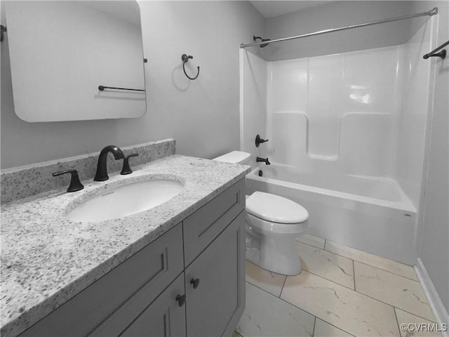 full bath featuring bathtub / shower combination, marble finish floor, toilet, and vanity