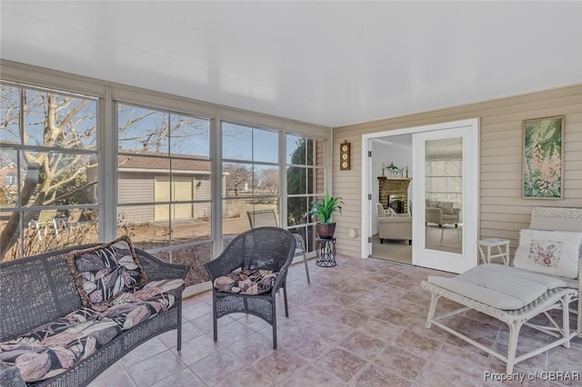 sunroom with plenty of natural light