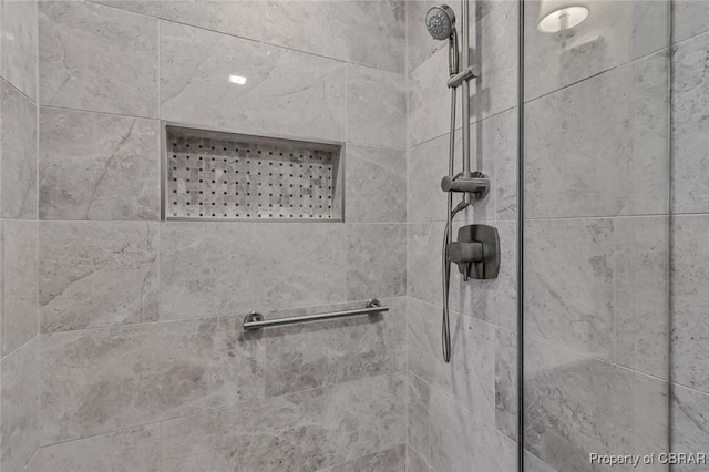 room details with a tile shower