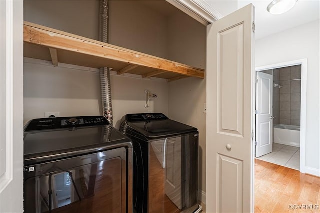 114 Cedar Works Row, Henrico, VA 23231 - clothes washing area featuring washer and dryer, laundry area, and light wood-style flooring