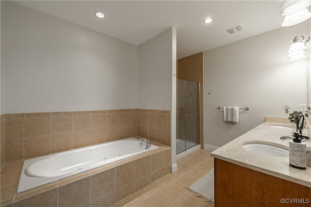 114 Cedar Works Row, Henrico, VA 23231 - full bathroom with a jetted tub, visible vents, tile patterned flooring, a shower stall, and a sink