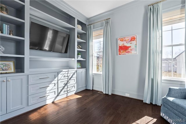 interior space with dark wood finished floors and baseboards