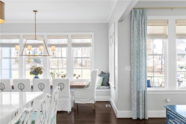 interior space featuring visible vents, a wealth of natural light, and a notable chandelier