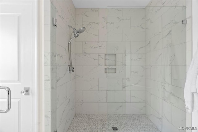 full bath featuring a stall shower