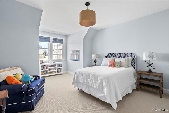 bedroom featuring baseboards and carpet flooring