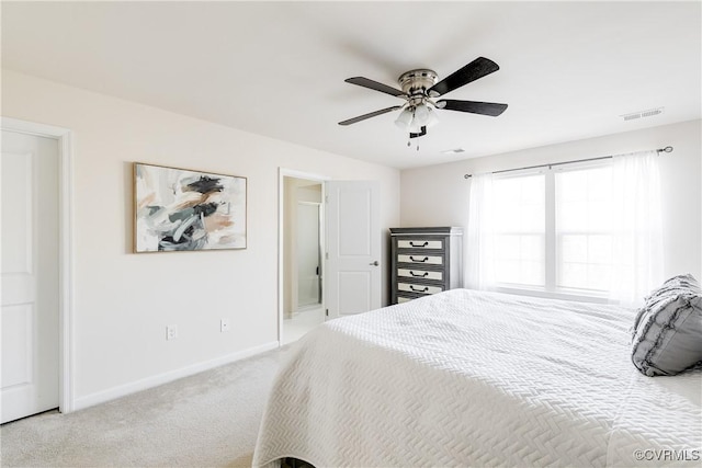 bedroom with light carpet, a ceiling fan, visible vents, and baseboards