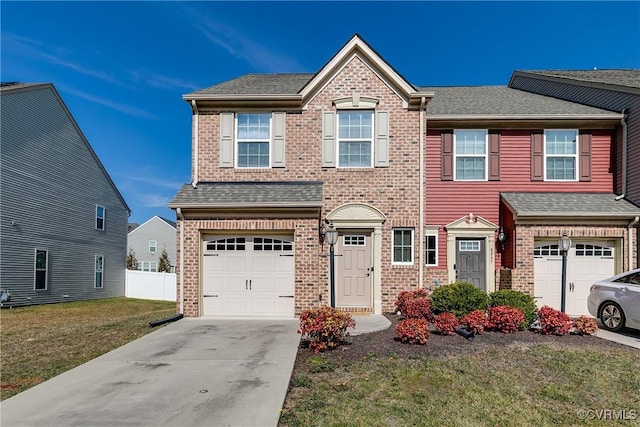 view of front of property featuring driveway, brick siding, an attached garage, fence, and a front yard