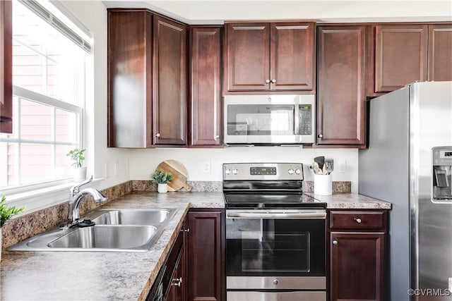 kitchen featuring stainless steel appliances and a sink