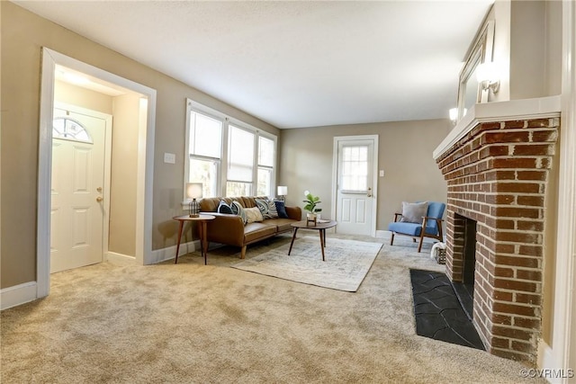 living area featuring a brick fireplace, light carpet, and baseboards