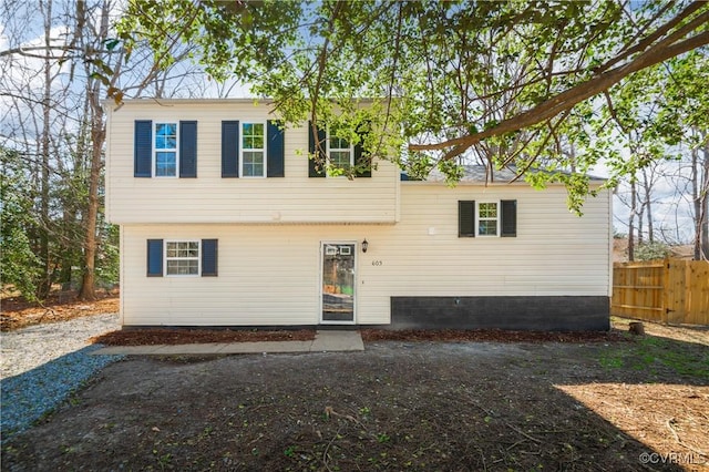 view of front of home with fence