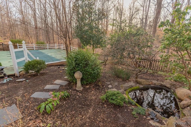 view of yard featuring fence