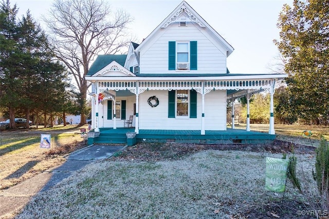 victorian home featuring a porch