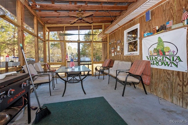 sunroom / solarium with ceiling fan