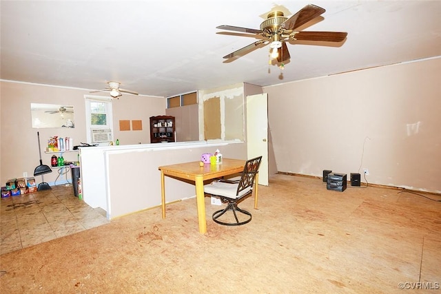 dining room with ceiling fan and tile patterned floors