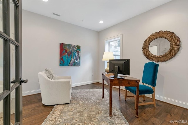 office with recessed lighting, visible vents, dark wood finished floors, and baseboards