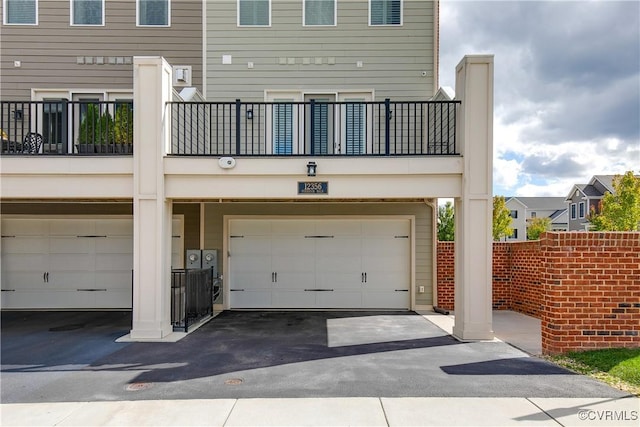 garage featuring driveway