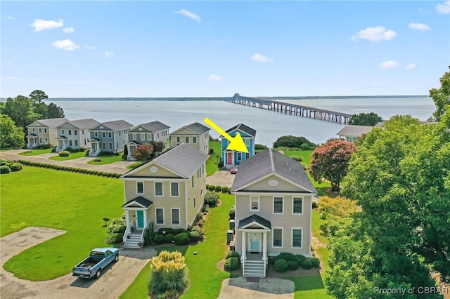 aerial view with a water view and a residential view