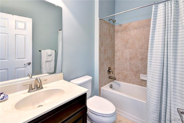 full bathroom featuring toilet, shower / bath combo, and vanity