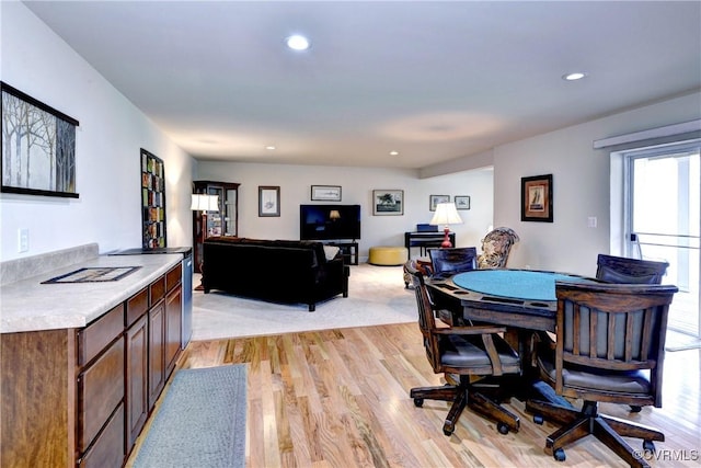 interior space with light wood finished floors and recessed lighting