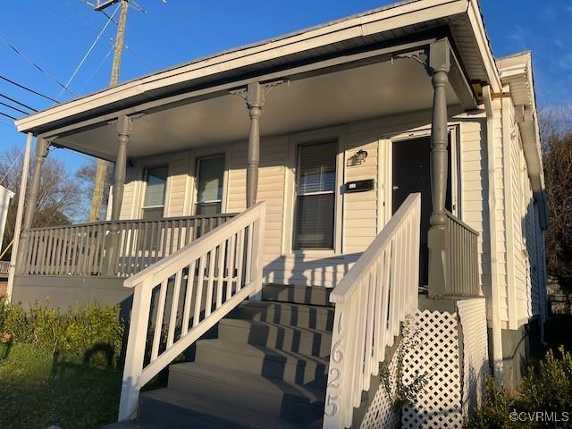 entrance to property with a porch