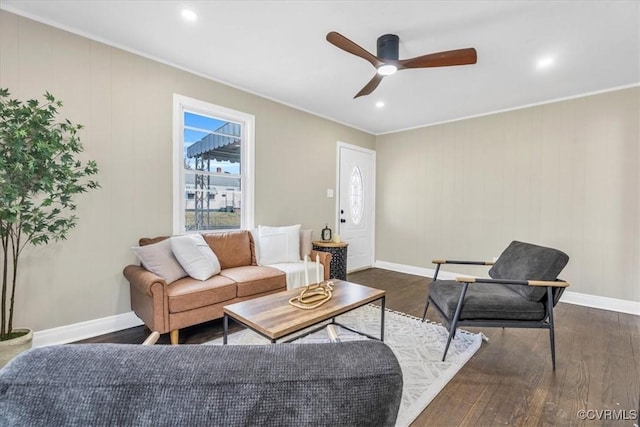 living room featuring a ceiling fan, baseboards, dark wood-type flooring, and recessed lighting