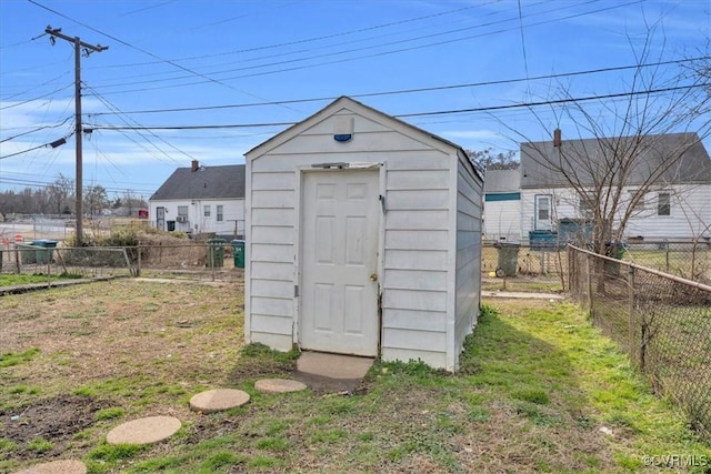 view of shed featuring fence private yard