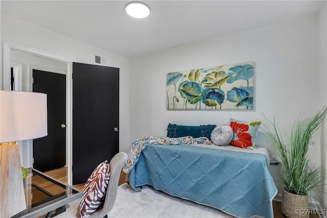 bedroom with visible vents