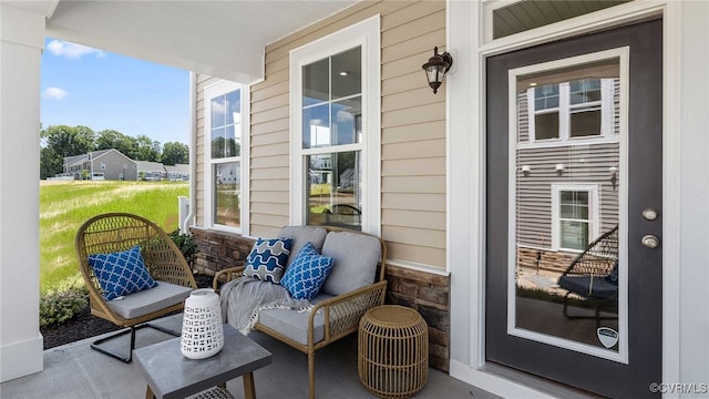 view of patio featuring a porch