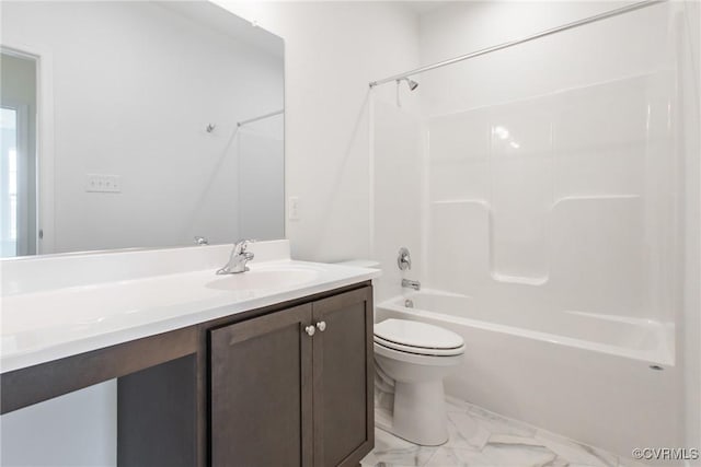 bathroom with marble finish floor,  shower combination, vanity, and toilet