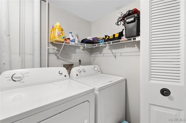 washroom with laundry area and washing machine and clothes dryer