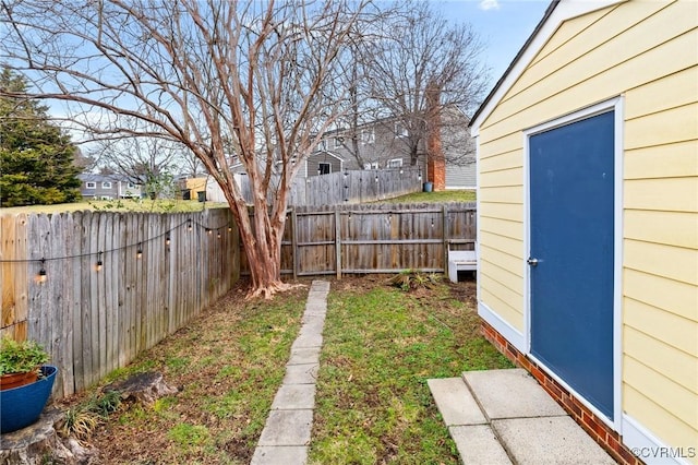 view of yard with a fenced backyard