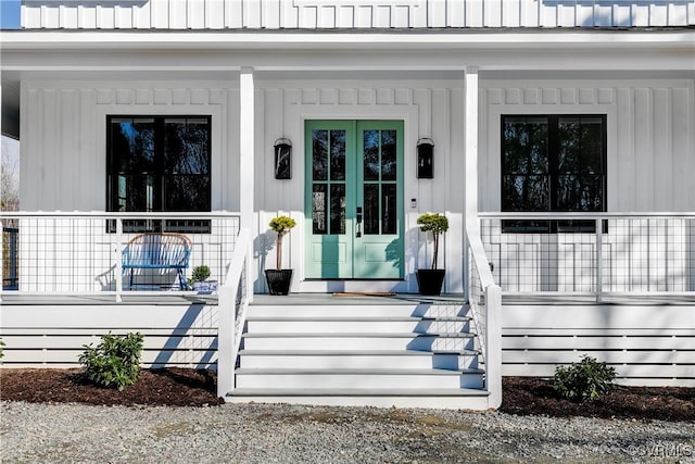 doorway to property with covered porch