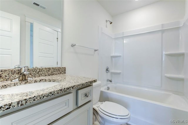 full bath with toilet, visible vents,  shower combination, and vanity