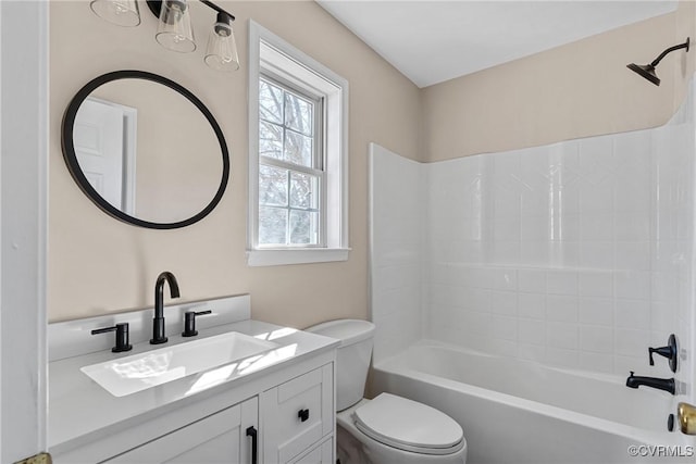 full bathroom with shower / tub combination, vanity, and toilet