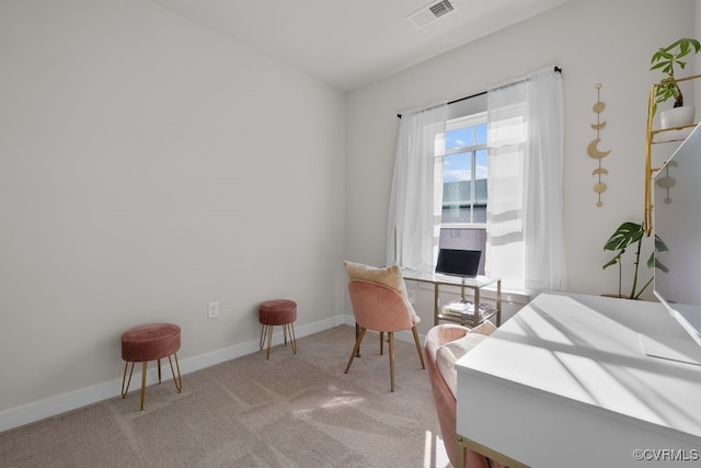 bedroom featuring light carpet, baseboards, and visible vents